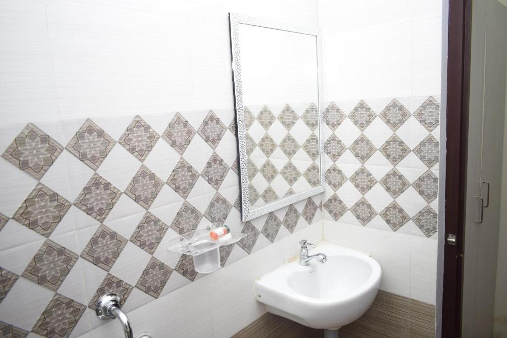 Koupelna v ubytování Bouvana Residency