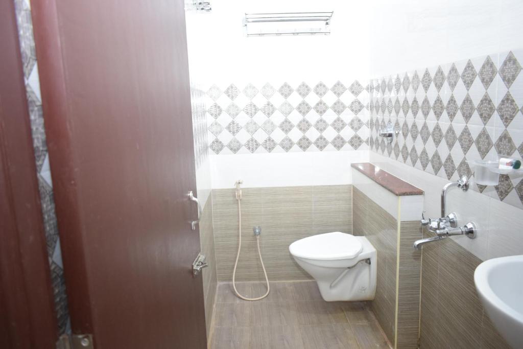 Koupelna v ubytování Bouvana Residency