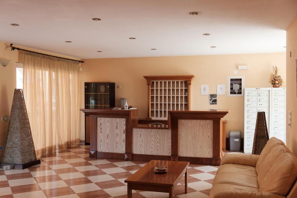 TV a/nebo společenská místnost v ubytování LUISA HOTEL