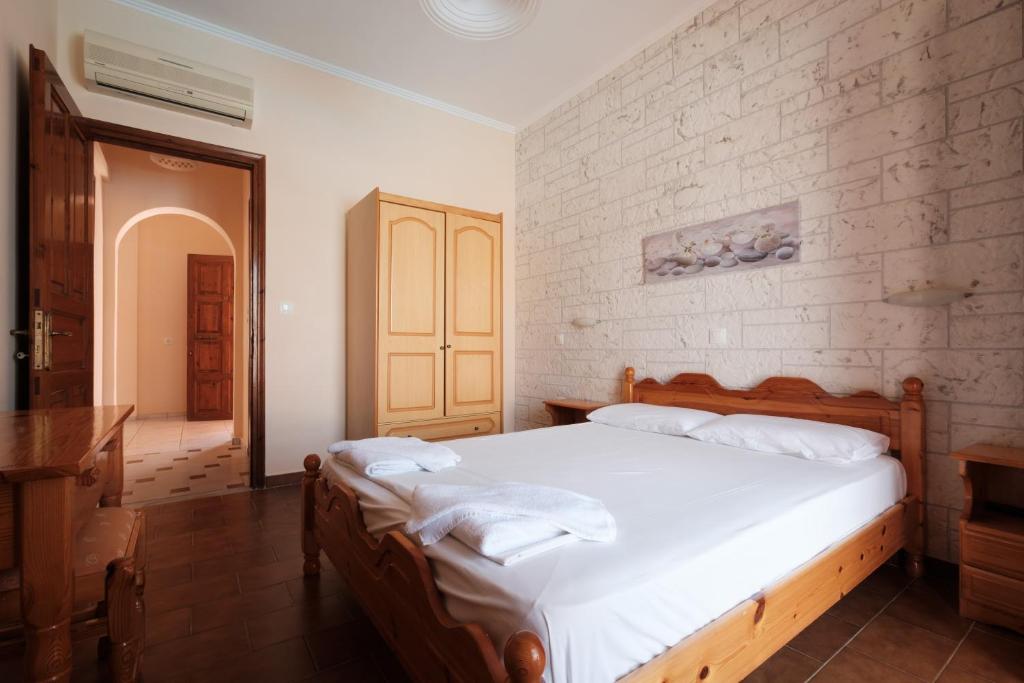 Postel nebo postele na pokoji v ubytování LUISA HOTEL
