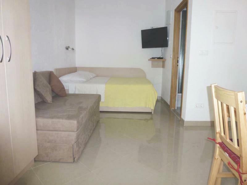 Postel nebo postele na pokoji v ubytování STUDIO APARTMENTS BaskaH2O