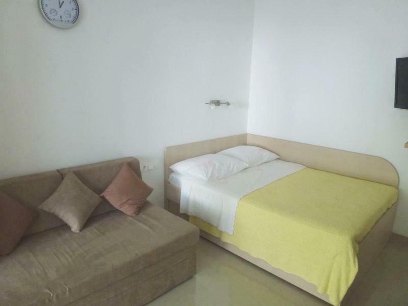 Postel nebo postele na pokoji v ubytování STUDIO APARTMENTS BaskaH2O