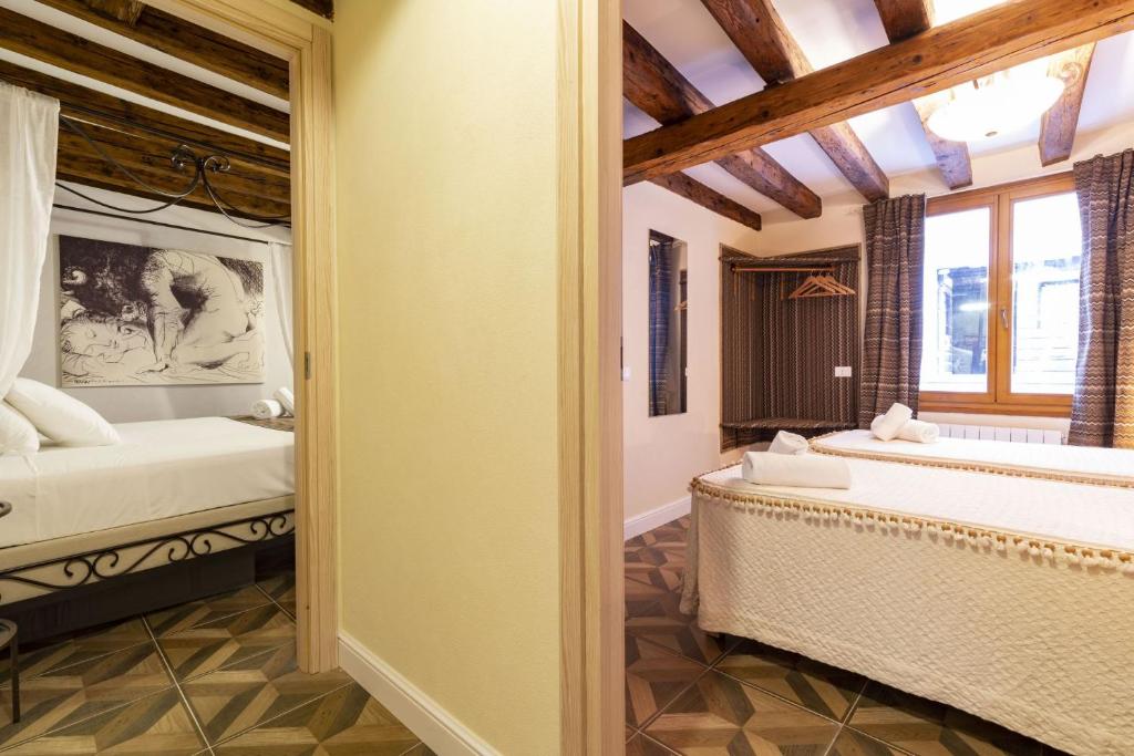 Postel nebo postele na pokoji v ubytování Il Nido di San Stae