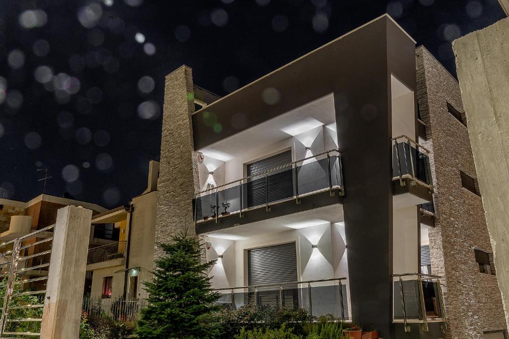 a building with balconies on the side of it at B&B La Rosa dei Venti in Altamura