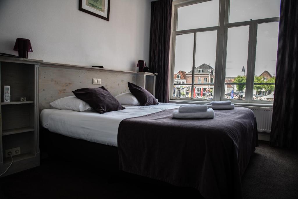 Postel nebo postele na pokoji v ubytování Hotel de Gaaper