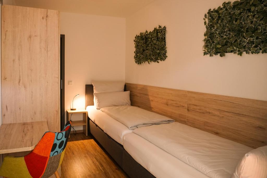 Postel nebo postele na pokoji v ubytování Hotel verWeiler