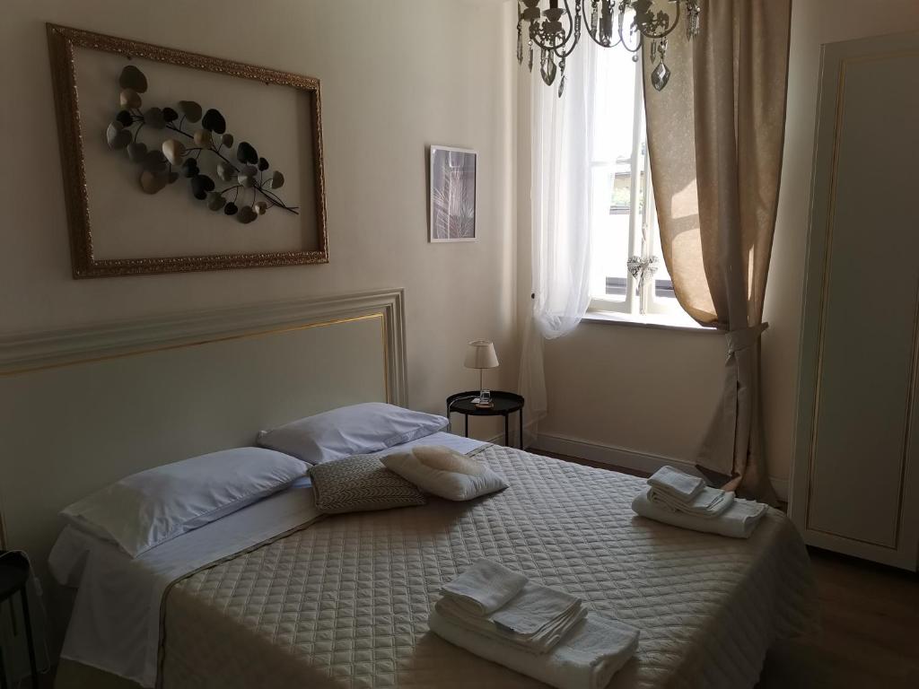 Postel nebo postele na pokoji v ubytování AriediParma - Rooms&apartments