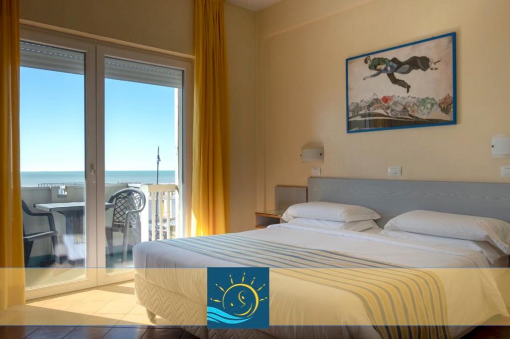 Postel nebo postele na pokoji v ubytování Hotel Ping Pong