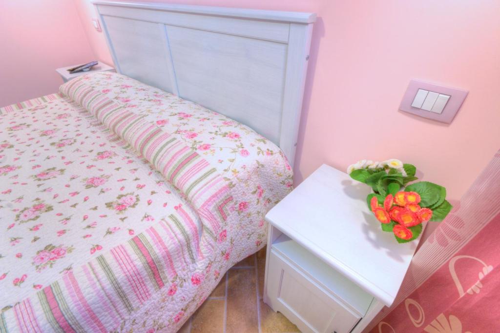 Postel nebo postele na pokoji v ubytování Locanda Del Picchio