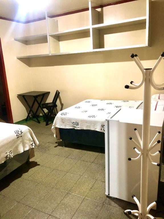 Postel nebo postele na pokoji v ubytování Hotel Fortaleza Manaus