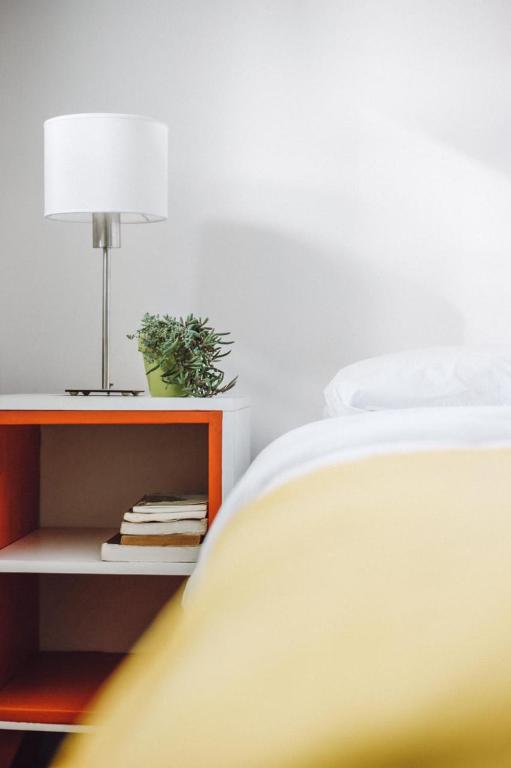 Postel nebo postele na pokoji v ubytování Hostel Hormiga Negra