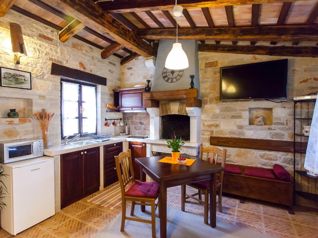 Kuchyň nebo kuchyňský kout v ubytování Sun Garden Premium Apartments