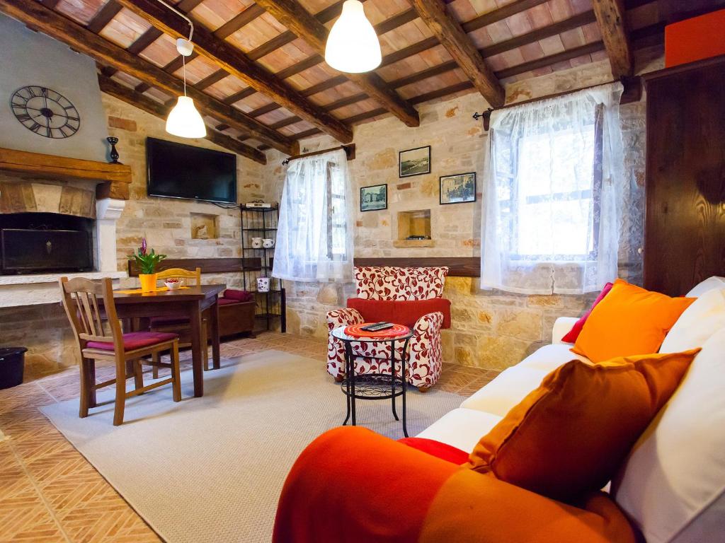 TV a/nebo společenská místnost v ubytování Sun Garden Premium Apartments
