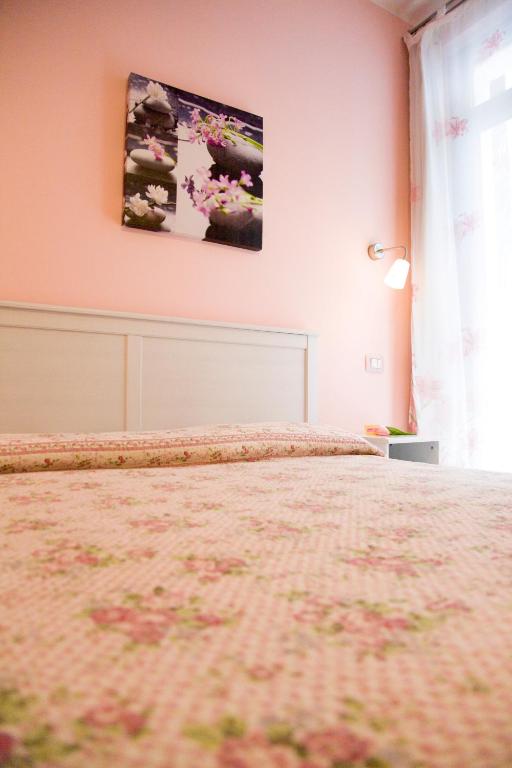 Postel nebo postele na pokoji v ubytování Locanda Del Picchio
