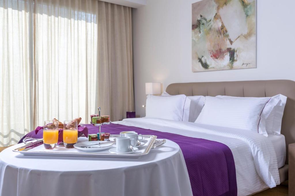 Postel nebo postele na pokoji v ubytování O Monot Boutique Hotel Beirut