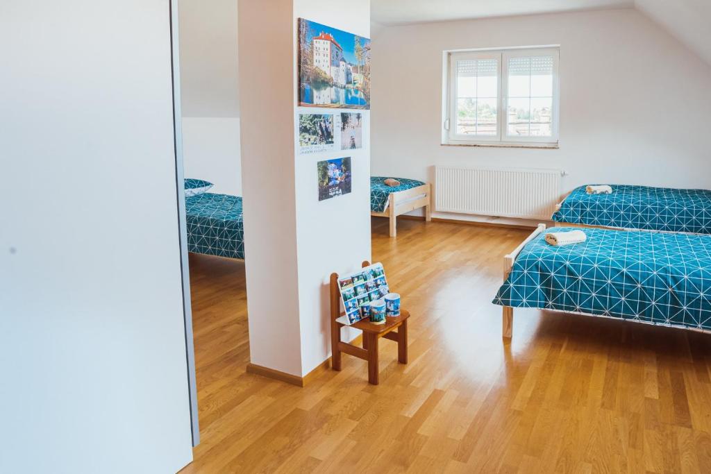 Postel nebo postele na pokoji v ubytování Apartment Sneznik