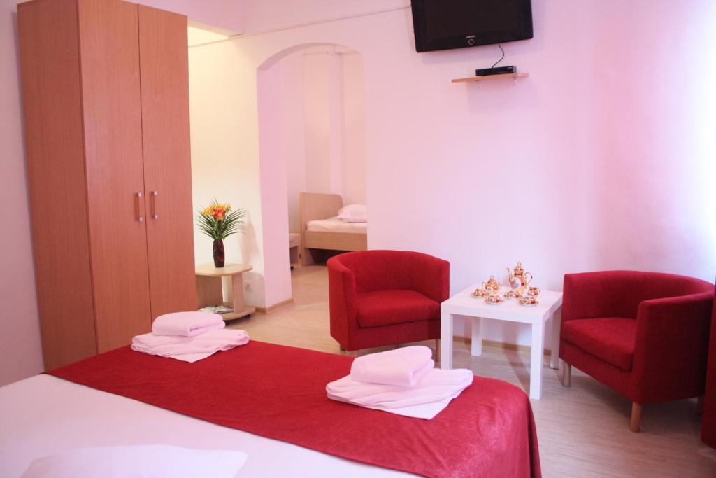 Postel nebo postele na pokoji v ubytování Hotel Sir Gara de Nord