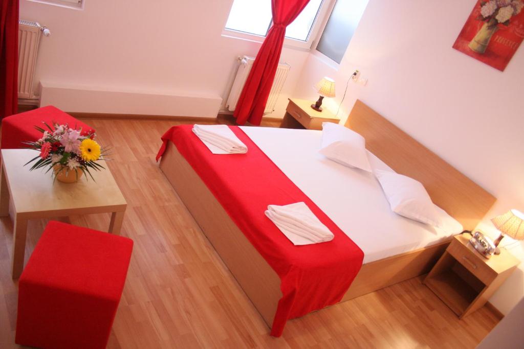 Postel nebo postele na pokoji v ubytování Hotel Sir Gara de Nord