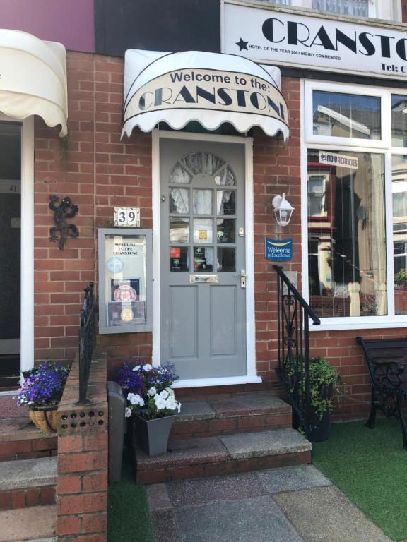 a store with a door and a sign that reads welcome to the banana at Cranstone Hotel in Blackpool