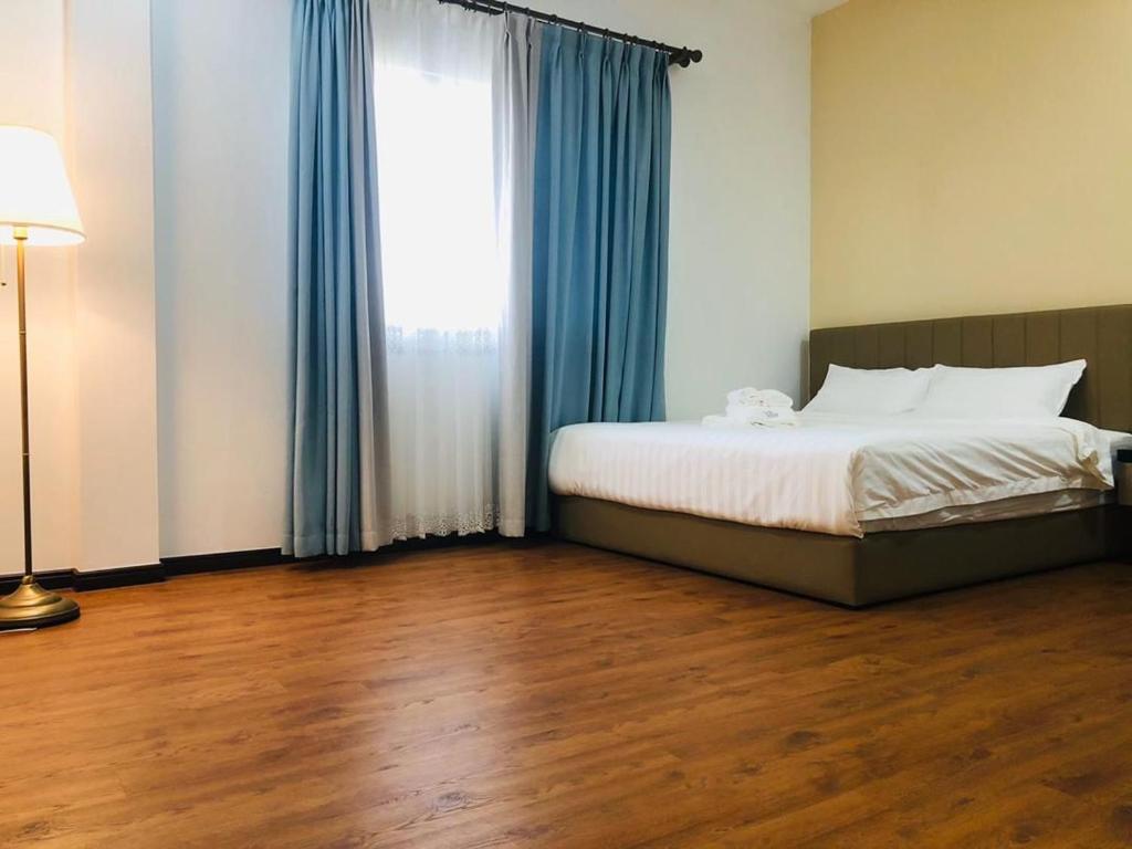 Postel nebo postele na pokoji v ubytování primaces avenue