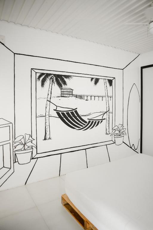 a drawing of a room with a hammock and palm trees at Suyog Life Siargao in General Luna
