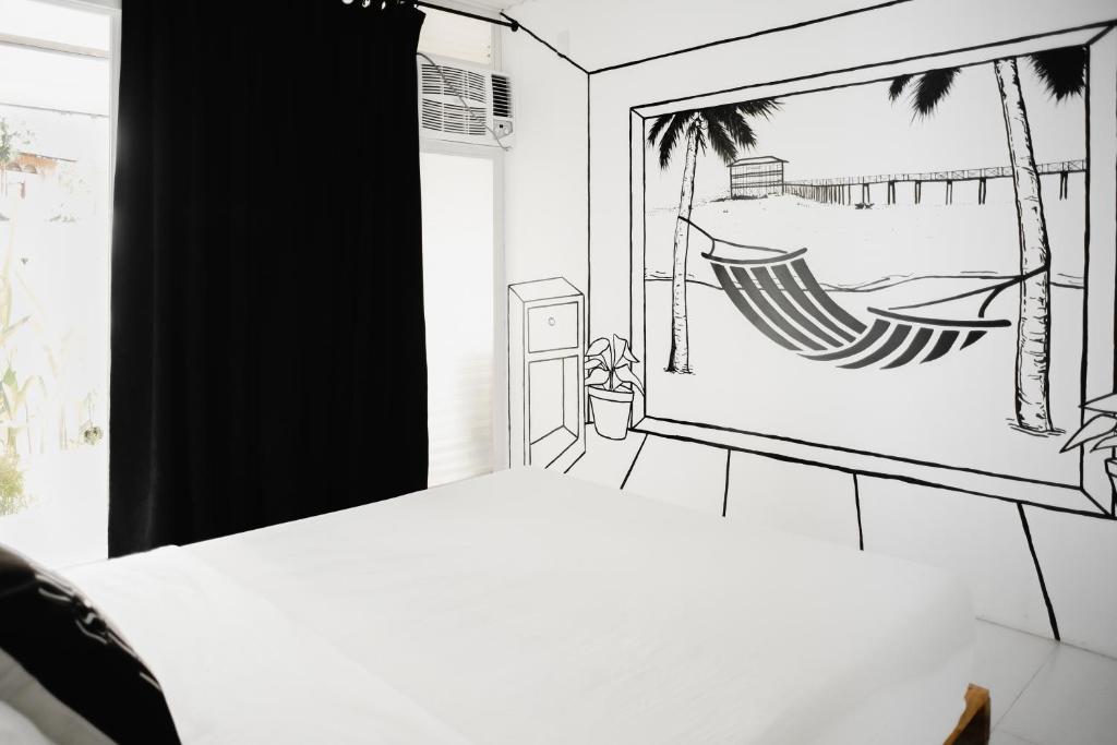 a drawing of a bedroom with a hammock at Suyog Life Siargao in General Luna