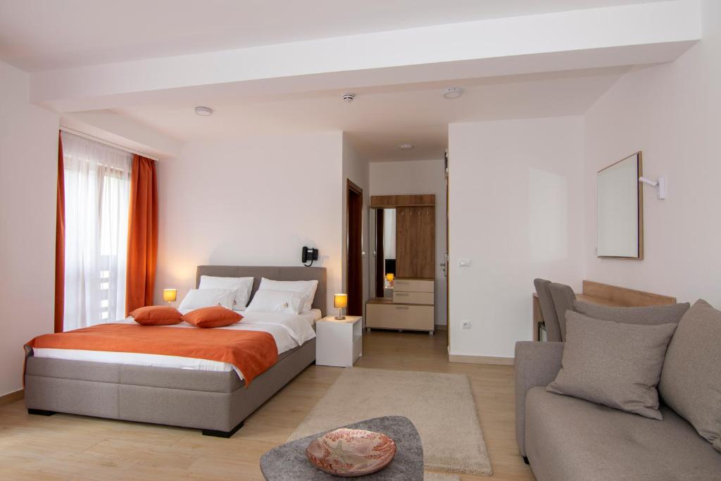 Krevet ili kreveti u jedinici u okviru objekta Hotel Agape