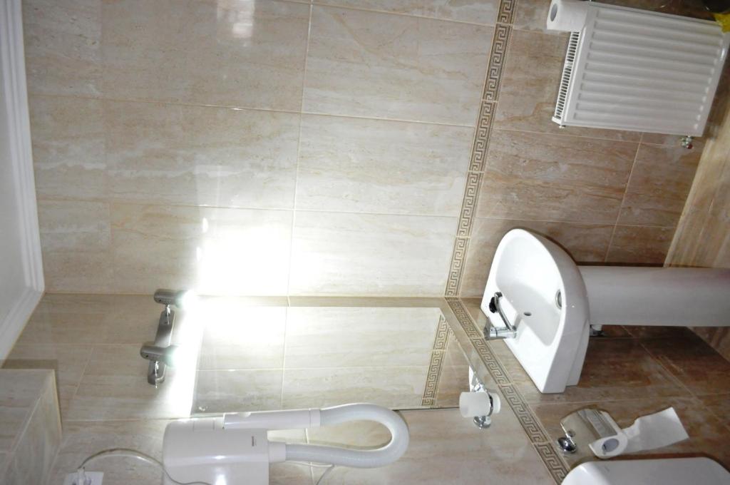 Koupelna v ubytování Hotel Andrei