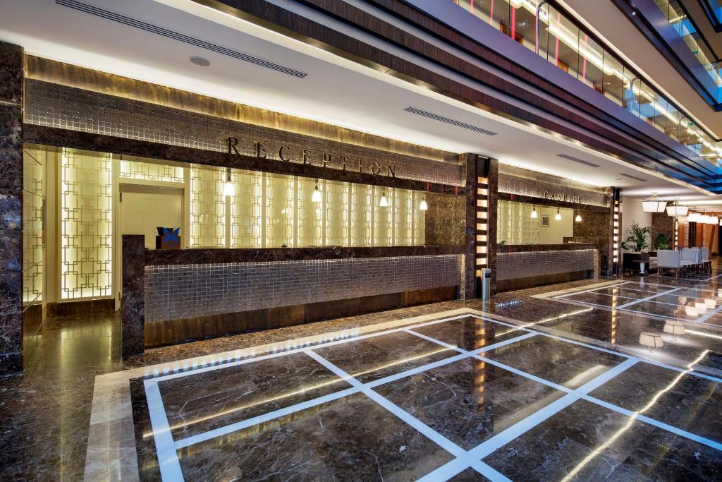 a lobby of a building with at Liberty Hotels Lara in Lara