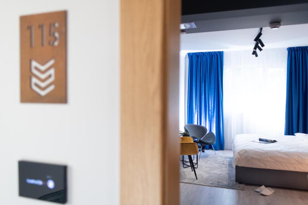 Postel nebo postele na pokoji v ubytování Campeador Inn