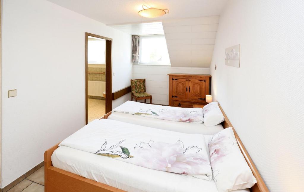 Postel nebo postele na pokoji v ubytování Haus Wegener