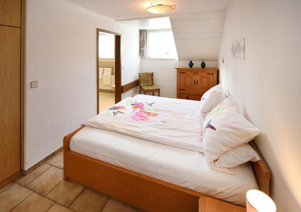 Postel nebo postele na pokoji v ubytování Haus Wegener
