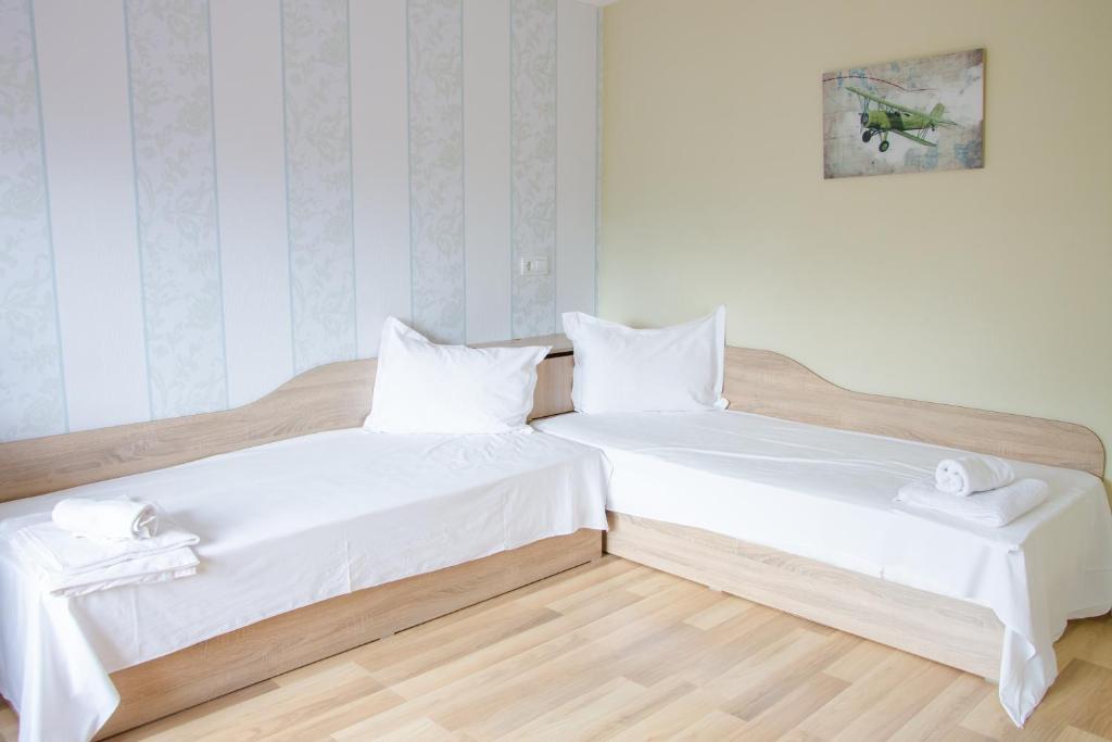 Postel nebo postele na pokoji v ubytování Hotel Fantazia