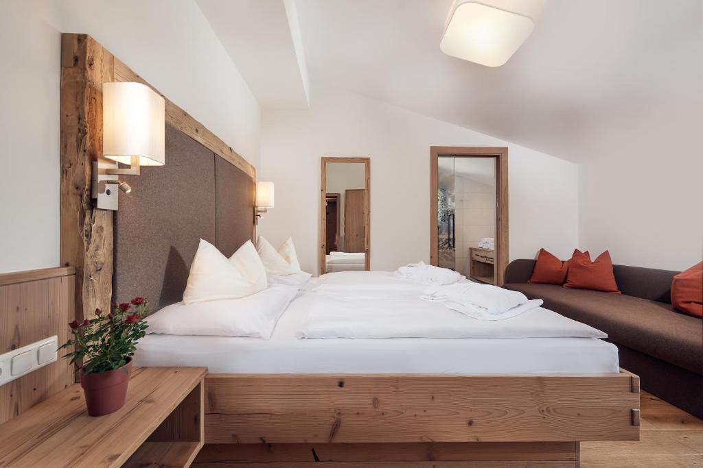 Postel nebo postele na pokoji v ubytování Hotel Gasthof Schützenhof