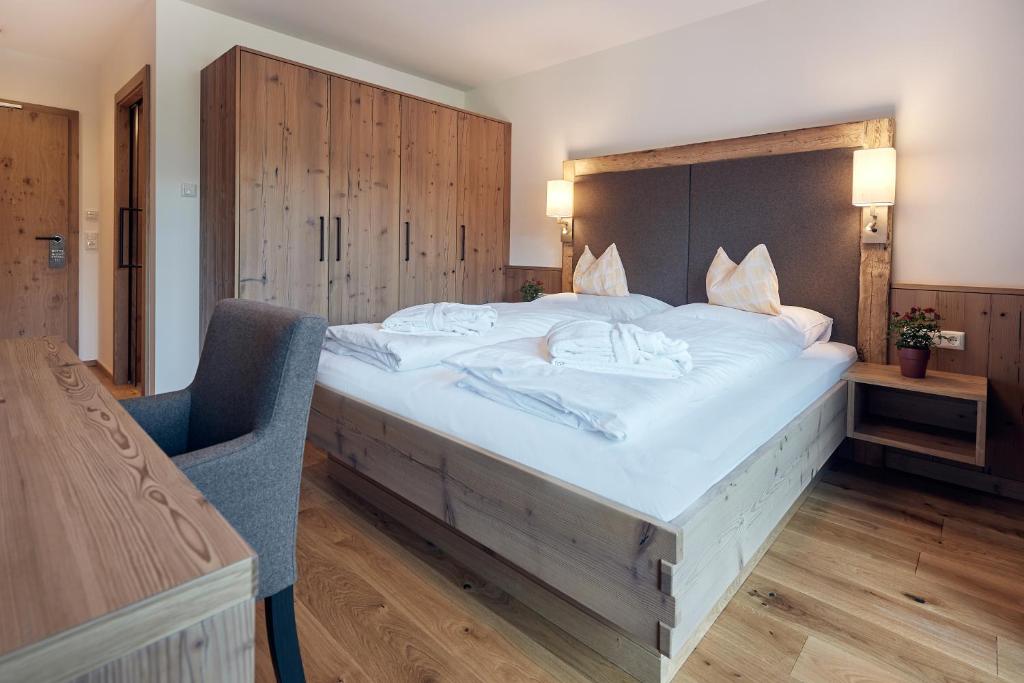 Postel nebo postele na pokoji v ubytování Hotel Gasthof Schützenhof