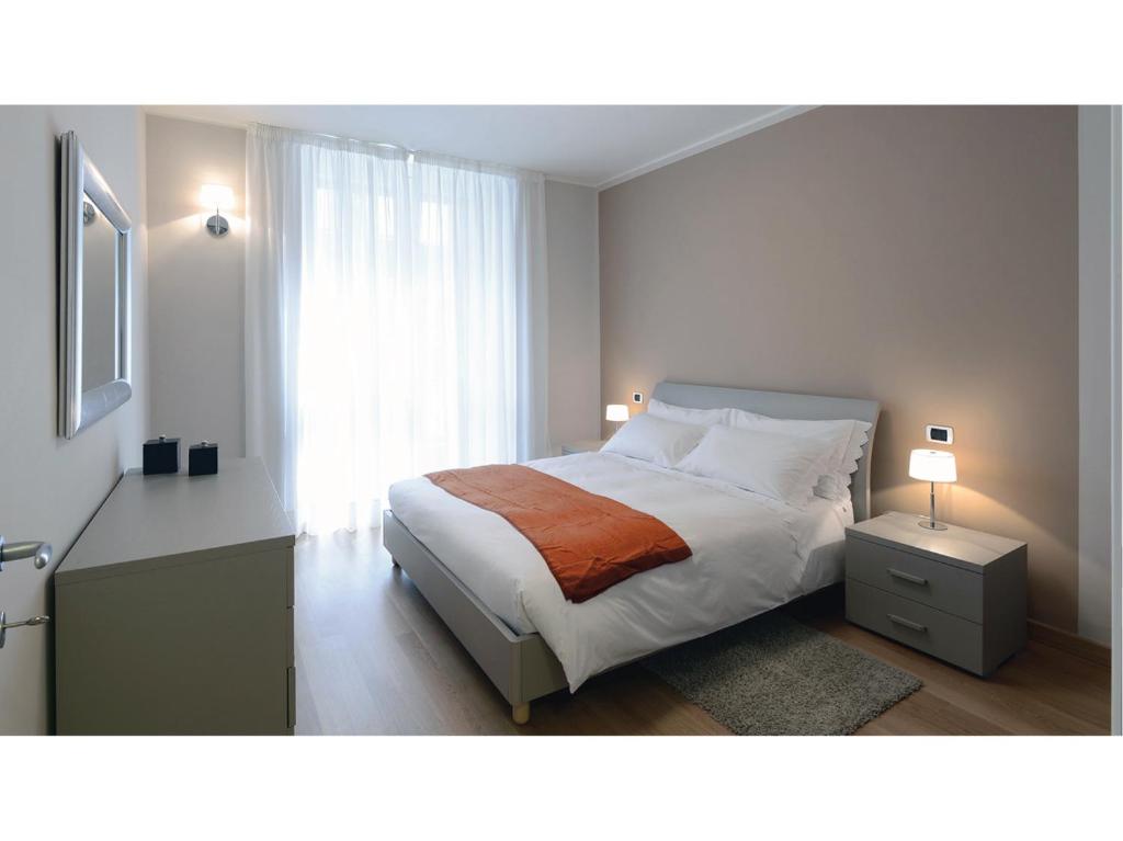 Кровать или кровати в номере Milan Retreats