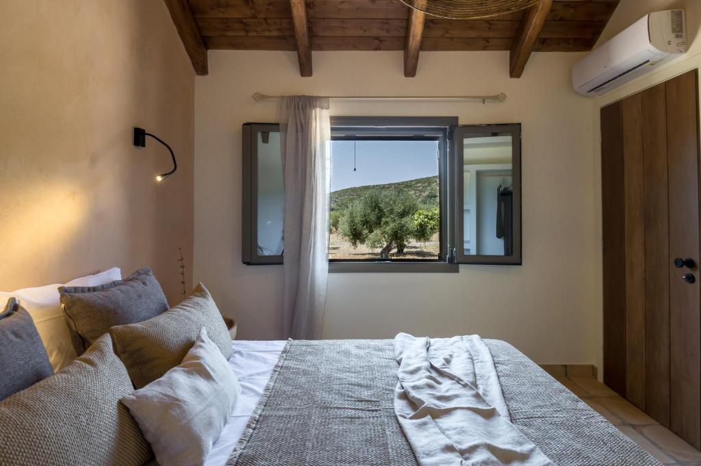 A bed or beds in a room at La Baracca