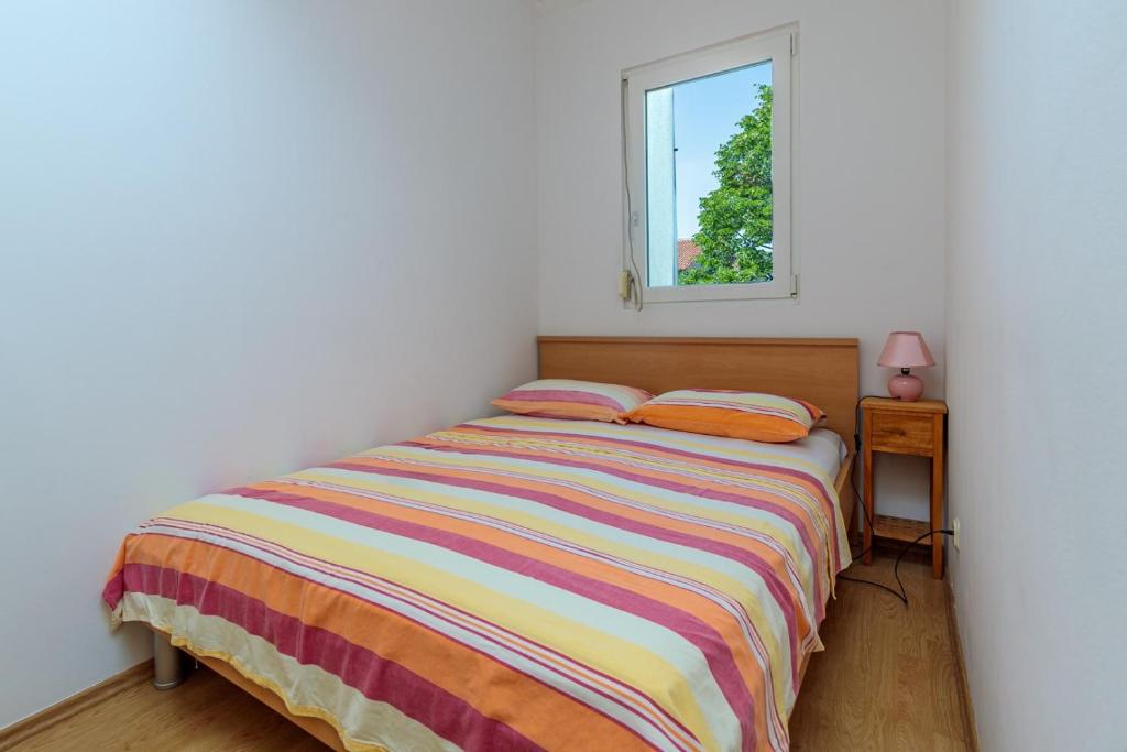 Postel nebo postele na pokoji v ubytování Vita