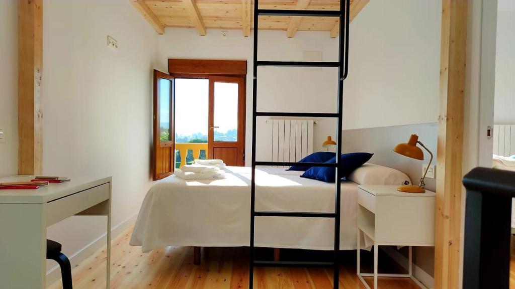 Postel nebo postele na pokoji v ubytování Viviendas Complejo Vacacional PLAYAS DE MUROS