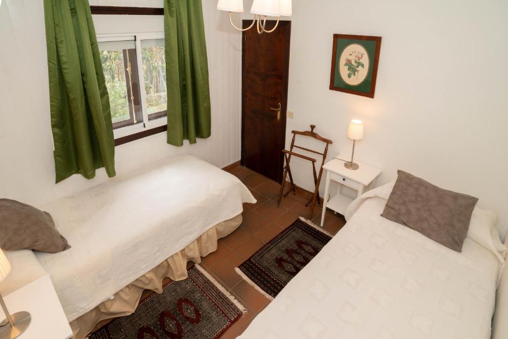 Postel nebo postele na pokoji v ubytování Finca La Hondura