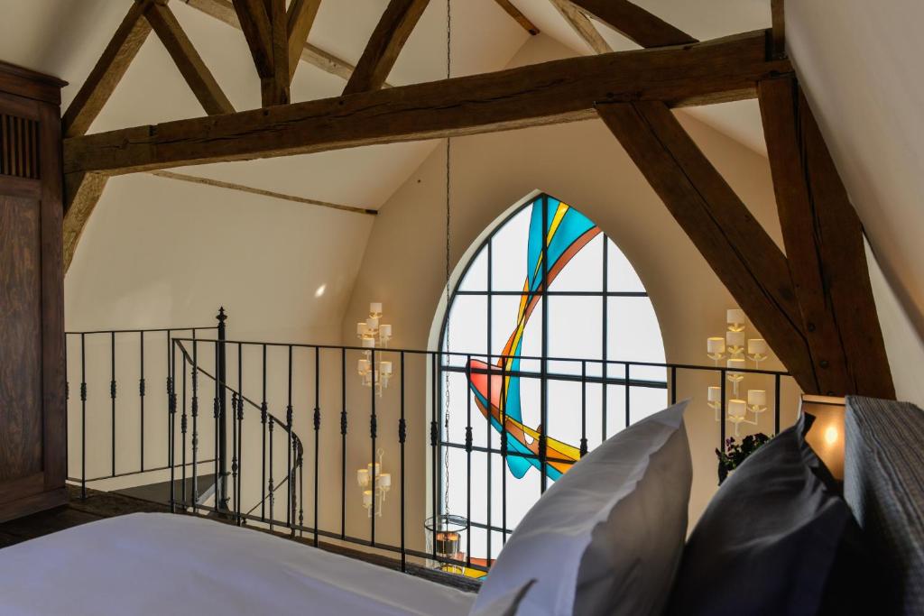 Postel nebo postele na pokoji v ubytování B&B The Verhaegen