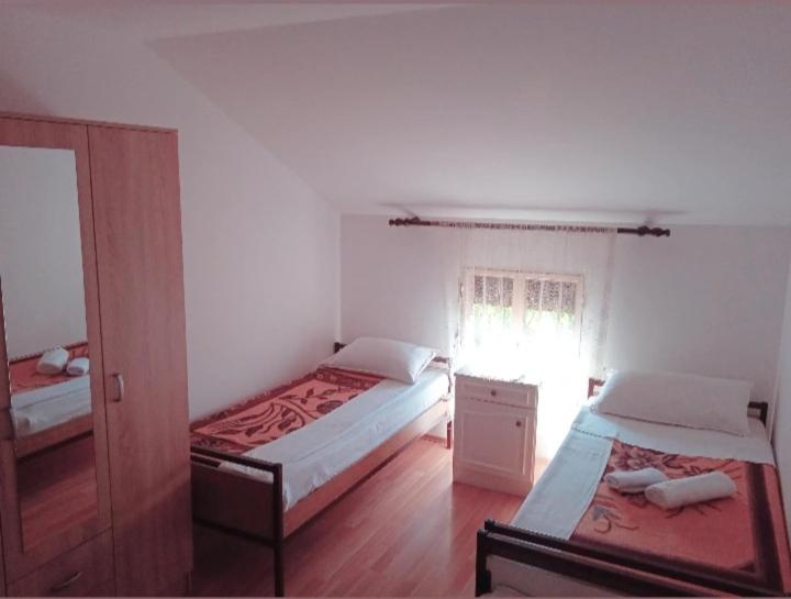 Postel nebo postele na pokoji v ubytování Hostel Vera - Airport Podgorica