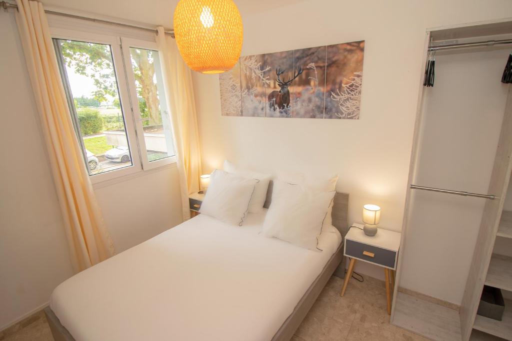Postel nebo postele na pokoji v ubytování La Hearty Room Logement en Colocation