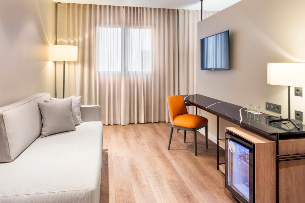 Una televisión o centro de entretenimiento en Eurostars Guadalquivir