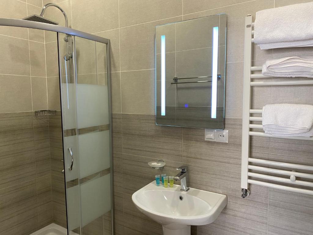 Koupelna v ubytování Hotel Sharl