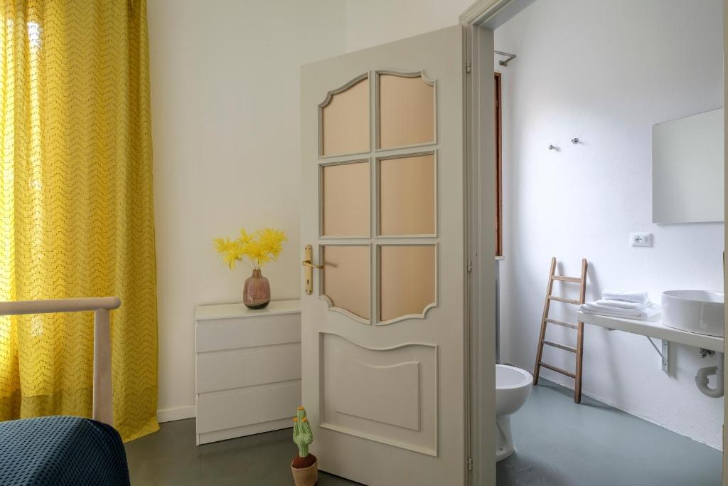 Postel nebo postele na pokoji v ubytování QuarantaVasi