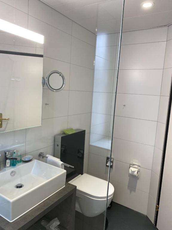 Un baño de Boutique City Hotel Gallo