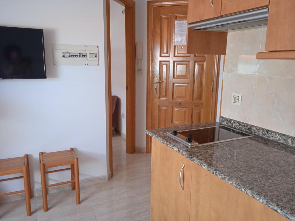 Kuchyňa alebo kuchynka v ubytovaní Apartamentos Turísticos O Pescador