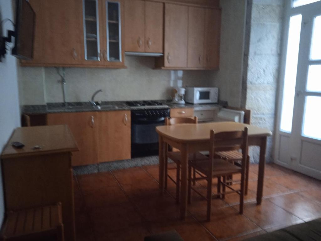Kuchyňa alebo kuchynka v ubytovaní Apartamentos Turísticos O Pescador