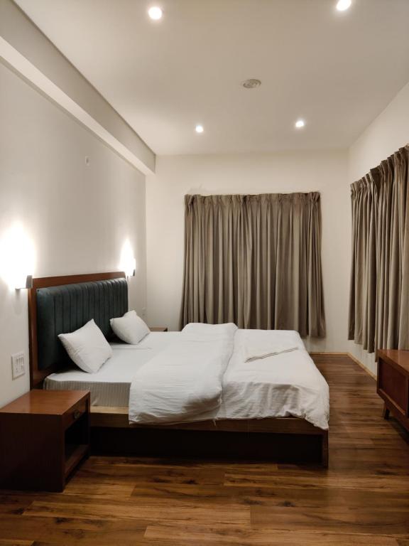 Letto o letti in una camera di Rock Castle Residency